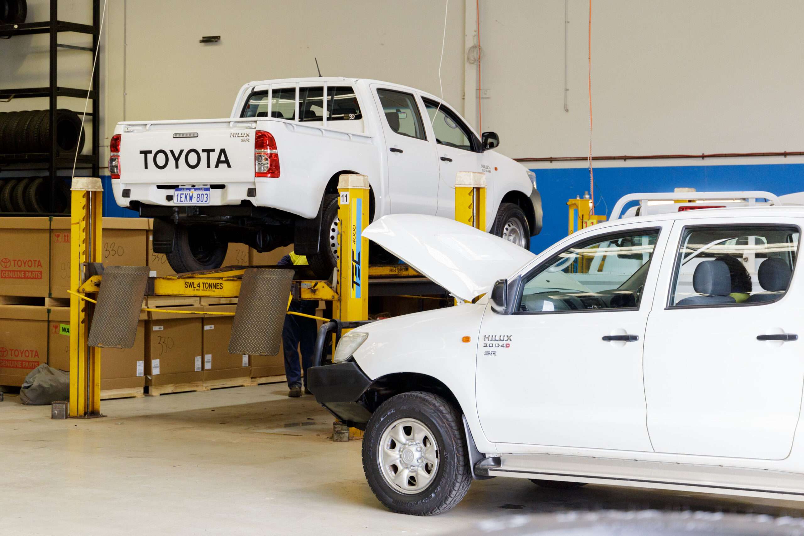 Toyota in garage, bonnet open